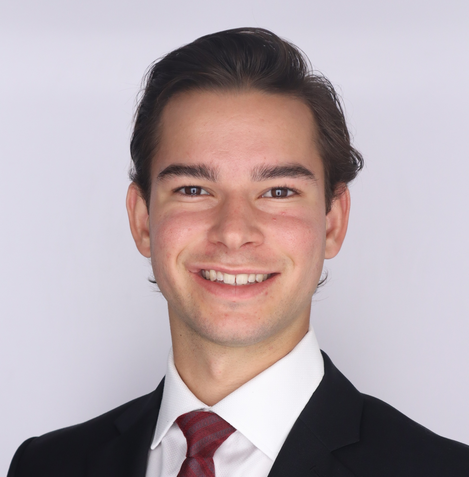 Professional headshot of Leo Fisher